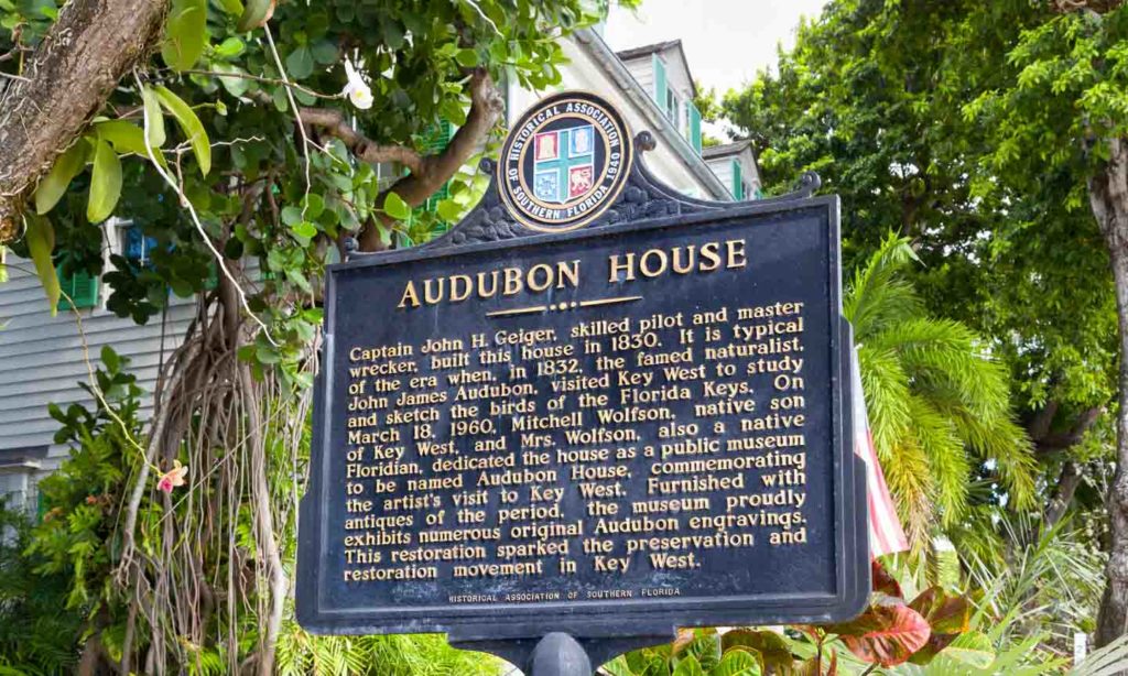 View of the sign and exterior of the Audubon House in Key West